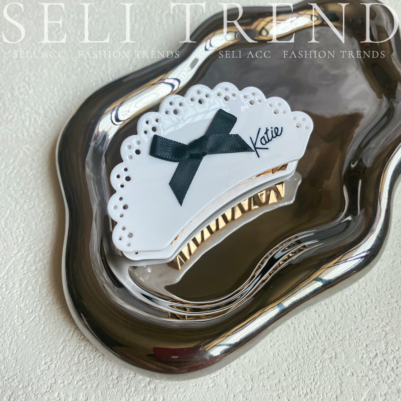 Wholesale Sweet and Cool Bow Hollow Letter Clip